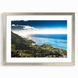 Textured art print featuring abstract oceanic shapes in cool blue and green tones, framed in silver, ideal for bedroom art.