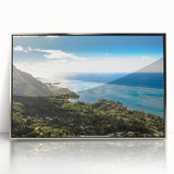 Mid-century modernist art of Tahiti shoreline in muted blue and green hues on a silver-framed acrylic print.