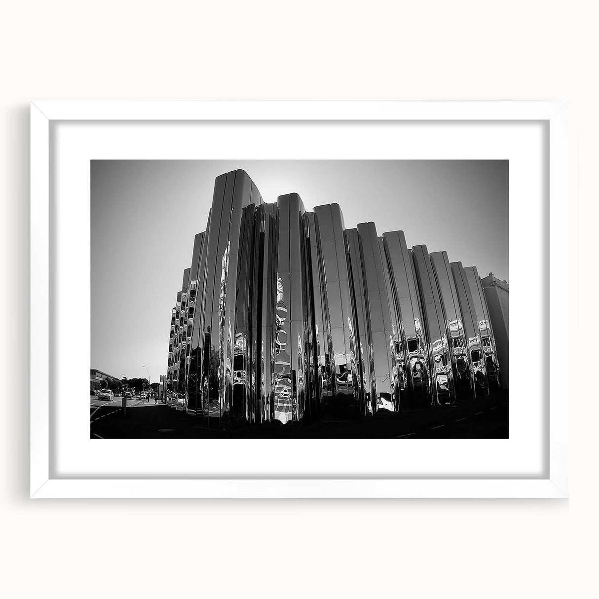 Abstract art print of Taranaki, New Zealand in muted earth tones on a white-framed canvas, ideal for dining room decor.