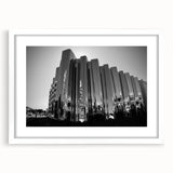 Abstract art print of Taranaki, New Zealand in muted earth tones on a white-framed canvas, ideal for dining room decor.