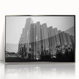 Mid-century modernist art of Mount Taranaki in New Zealand, featuring muted earth tones on a silver-framed acrylic print.