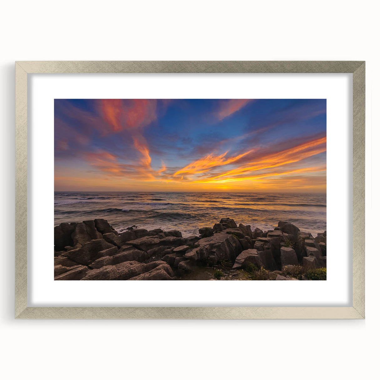 Textured abstract art print depicting New Zealand's West Coast in muted blue and green tones on a framed canvas.