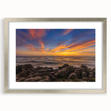 Textured abstract art print depicting New Zealand's West Coast in muted blue and green tones on a framed canvas.