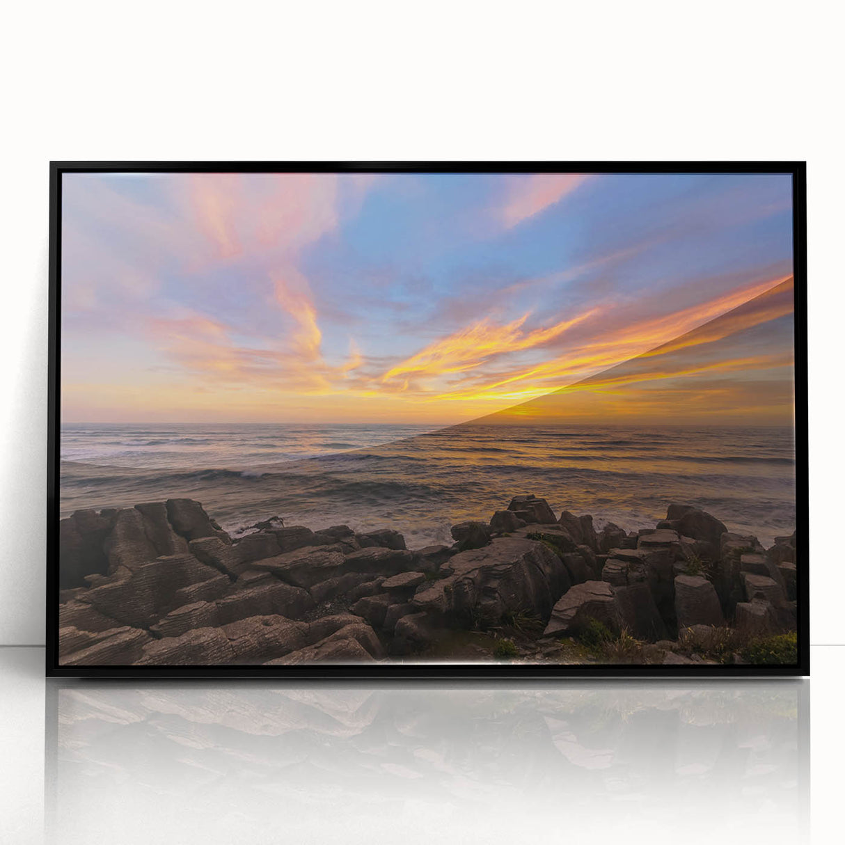 Large abstract wall art depicting New Zealand's West Coast in muted earth tones, framed in black acrylic.