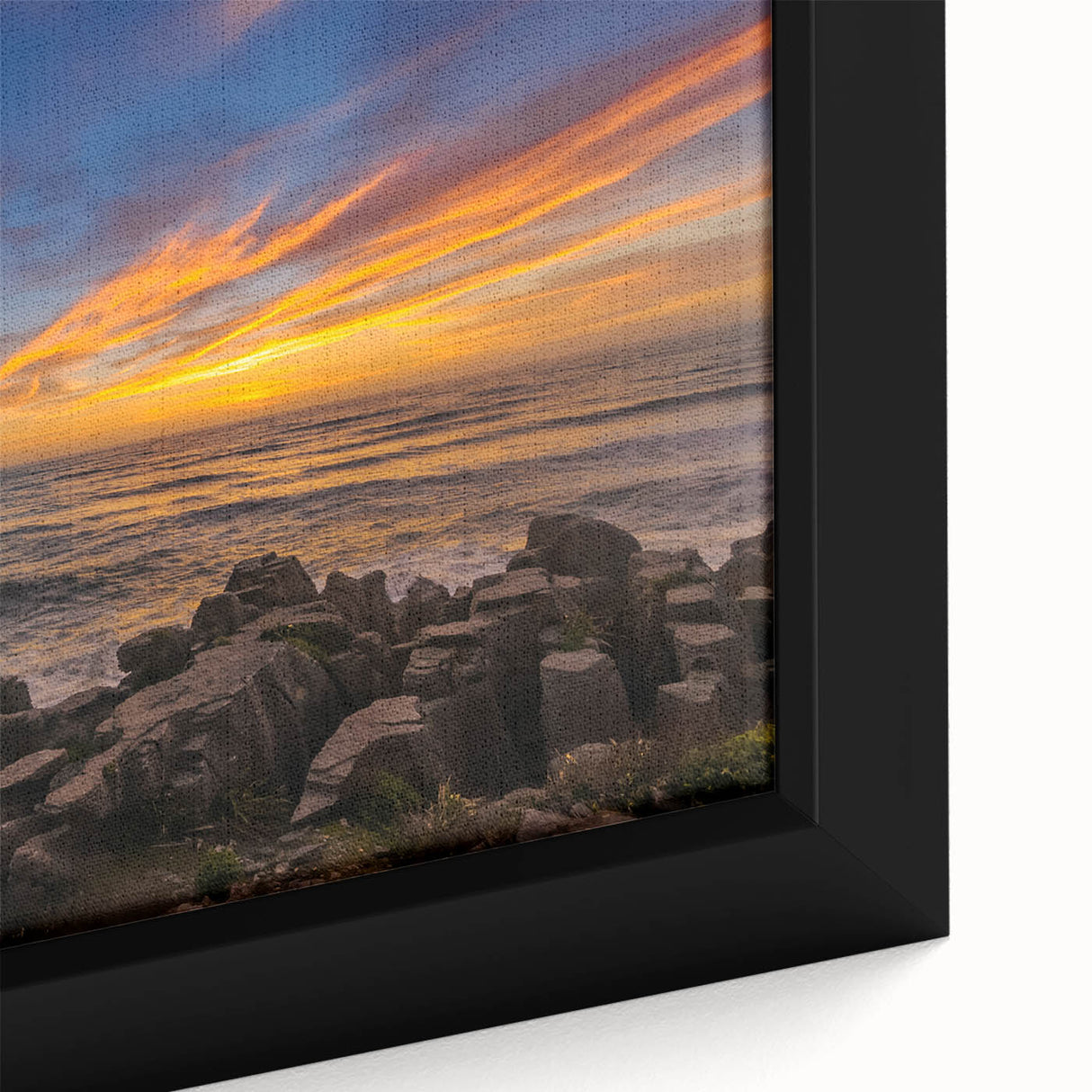 Black wall art featuring a textured depiction of New Zealand's West Coast on a framed canvas, ideal for living room decor.