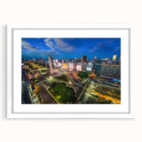 Abstract art print of Buenos Aires skyline in muted blue and gray tones on a white framed canvas.