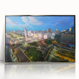 Mid-century modernist art of Buenos Aires skyline in silver acrylic frame, using pastel hues.