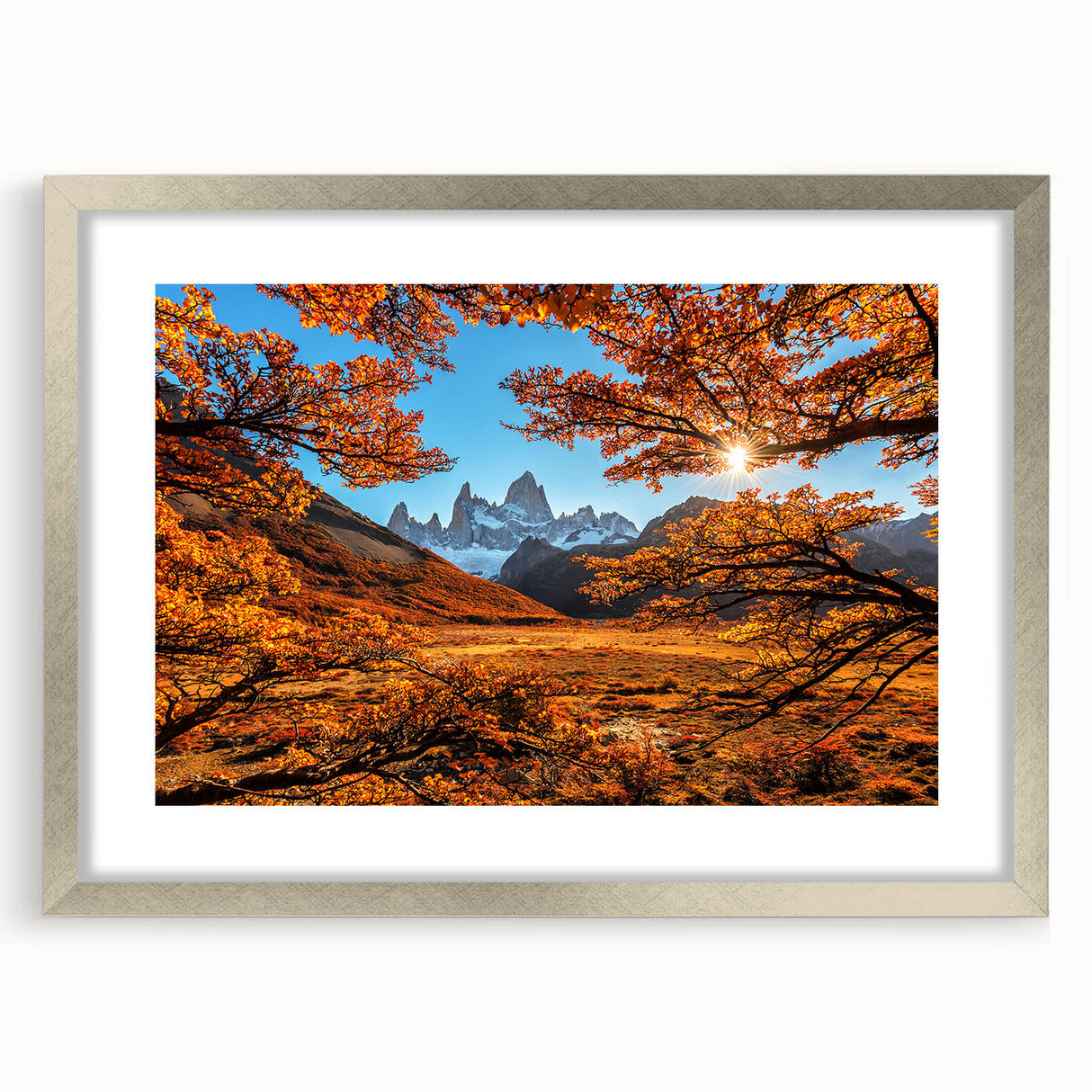 Textured abstract art print of an Argentine landscape in muted earth tones, framed with a silver mat.