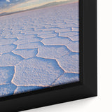 Extra large framed canvas of a Bolivian landscape in black with colorful, textured details, suitable for living room decor.