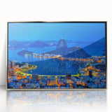 Mid-century modernist art depicting a vibrant Brazilian landscape on a silver-framed acrylic print.