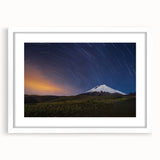 Abstract art print depicting the Galápagos Islands, in muted earth tones on a white framed canvas.