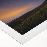 Art deco poster of Galapagos scenery on rolled canvas, featuring cool blue and green tones.