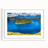 Abstract art print of a South American landscape in muted earth tones on a white framed canvas.