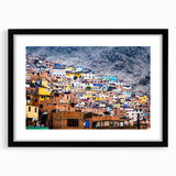 Abstract art print featuring a textured, colorful depiction of a South American landscape on a large framed canvas.