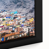 Extra large framed canvas featuring a textured depiction of a Peruvian landscape in black with vibrant, colorful accents.