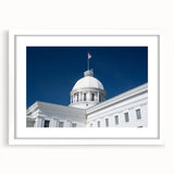 Abstract art print of a vibrant Alabama landscape in a white frame, ideal for dining room decor.