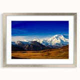 Textured art print of Denali, Alaska, in abstract style with muted earth tones on a framed silver mat.