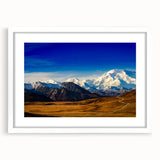 Abstract art print of Denali, Alaska, in muted earth tones on a framed white canvas.