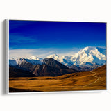 Vintage poster art of Denali, Alaska in colorful tones on extra large framed canvas, ideal for living room decor.
