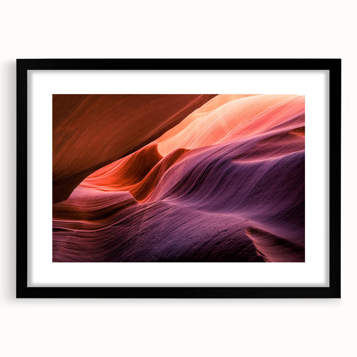 Extra large framed print of abstract Antelope Canyon in vibrant red and orange tones, ideal for living room decor.