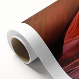 Art Deco-style poster of Antelope Canyon in Arizona, displayed on rolled canvas, featuring earthy red and orange tones.