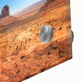 Mid-century modernist art of Monument Valley in muted earth tones on acrylic glass, ideal for dining room art.
