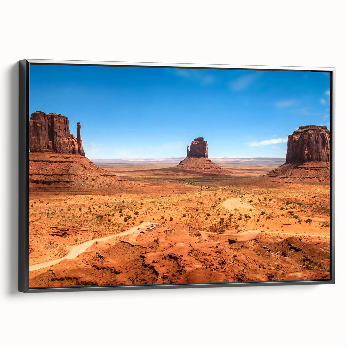 Black and white wall art of Monument Valley on a framed canvas, ideal for bedroom decor with a vintage poster style.
