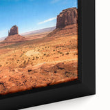 Extra large black wall art of Monument Valley on textured canvas, featuring vibrant colors, ideal for living room decor.