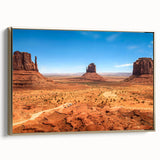 Framed canvas of Monument Valley with warm golden tones, ideal for bedroom landscape art.