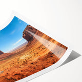 Extra large wall art of Monument Valley in Arizona, displayed on a rolled print, suitable for large living room decor.