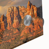 Large abstract wall art depicting the Sedona, Arizona landscape in muted earth tones on acrylic glass.