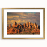 Extra large wall art depicting an abstract Sedona landscape in textured gold and earth tones, ideal for living room decor.