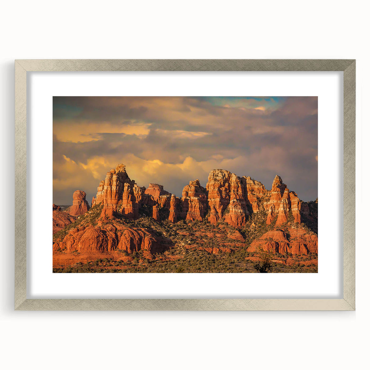 Textured abstract art print of Sedona, Arizona in muted earth tones on a framed canvas, ideal for bedroom decor.