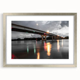 Textured abstract art print of Arkansas scenery in muted earth tones, framed with a silver mat, suitable for bedroom decor.