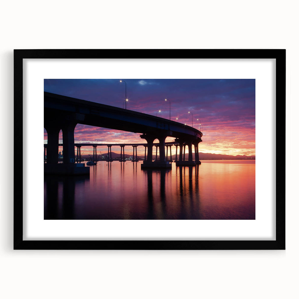 Extra large abstract art print of colorful, textured scenery, framed in black, ideal for living room decor.