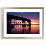 Textured abstract art print of Coronado, California in muted earth tones on a framed silver mat, suitable for bedroom decor.