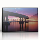 Large abstract wall art depicting the Coronado, California coastline in muted gray and blue tones, framed in black acrylic.