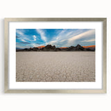 Textured art print of Death Valley in muted earth tones on a framed canvas, suitable for bedroom decor.