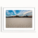 Abstract art print of Death Valley in muted brown and beige tones on a framed white canvas.