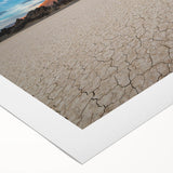 Art deco poster of Death Valley, featuring muted earth tones on rolled canvas, suitable for dining room decor.