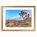 Extra large wall art featuring an abstract depiction of Joshua Tree in textured shades of gold and brown, framed with a mat.