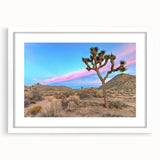 Abstract art print of Joshua Tree in muted earth tones on a white-framed canvas, suitable for bedroom or dining room decor.