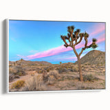 Vintage poster art of Joshua Tree on a large framed canvas, featuring muted earth tones, ideal for living room decor.