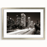 Textured abstract art print of Los Angeles skyline in muted gray and silver, framed with a mat, ideal for bedroom art.