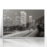 Acrylic print of Los Angeles skyline in art deco style with pastel hues, framed in white, suitable for modern nursery decor.