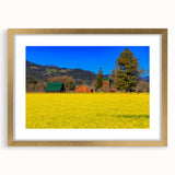 Extra large abstract art print of Napa Valley in textured shades of green and gold, framed in gold.