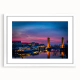 Abstract art print of Sacramento scenery in muted earth tones on a framed white mat, suitable for dining room decor.