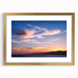 Extra large wall art featuring a textured abstract print of Santa Monica in muted gold and blue tones, framed in gold.