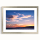 Textured abstract art print of Santa Monica scenery in muted blue and gray tones, framed in silver, ideal for bedroom art.