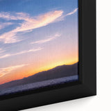 Black wall art featuring a textured, colorful depiction of Santa Monica on a framed canvas, ideal for living room decor.